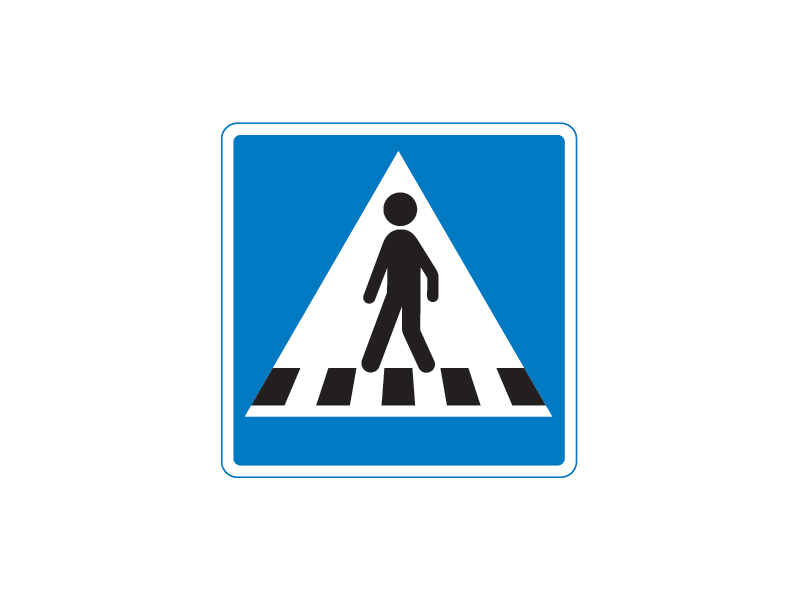 Færdselstavle E17.1 er en oplysningstavle og har betydningen "Fodgængerfelt" mod venstre..